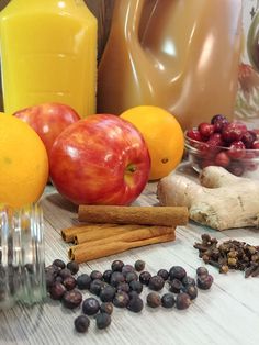 an assortment of fruits and spices on a table