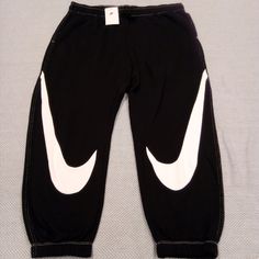 Nike Joggers Womens Plus 1X Sportswear big Swoosh Fleece Tapered black White. Condition New with Tags Ships priority Nike Joggers, Active Wear Pants, Joggers Womens, Black Nike, Nike Outfits, Black Nikes, Sneakers Nike, White And Black, Active Wear