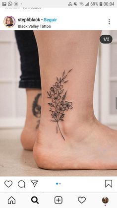 a small flower tattoo on the ankle