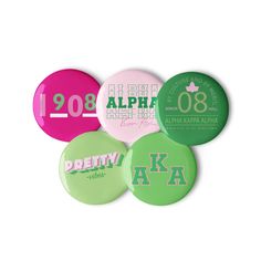 five different colored badges with the names of each school and their letters on them, all in various colors