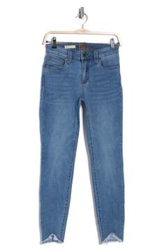 Go casual in ankle-length skinny jeans constructed from soft stretch denim with frayed sharkbite hems. 27" inseam; 9" leg opening; 9 1/4" front rise; 15" back rise (size 8) Zip fly with button closure Five-pocket style 72% cotton, 23% polyester, 3% rayon, 2% spandex Machine wash, tumble dry Imported Spring Medium Wash Jeggings With Five Pockets, Casual Straight Leg Jeggings With Frayed Hem, Spring Cropped Leg Medium Wash Jeggings, Casual Cropped Leg Jeggings For Spring, Spring Straight Leg Jeggings With Frayed Hem, Casual Jeggings With Frayed Hem, Spring Medium Wash Cropped Jeggings, Non-stretch Ankle-length Jeans With Pockets, Ankle-length Cotton Jeans With Side Pockets