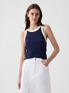 Modern Rib Cropped Halter Top Chic Sleeveless Gap Tops, Chic Sleeveless Tops By Gap, Trendy Gap Tank Top For Summer, Trendy Gap Summer Tank Top, Trendy Gap Tank Top For Spring, Trendy Fitted Gap Tank Top, Trendy Fitted Tank Top By Gap, Trendy Fitted Tank Top From Gap, Gap Stretch Tank Top For Spring