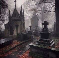 an old cemetery with tombstones in the foreground