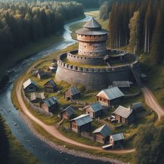 an aerial view of a small village with a river running through it