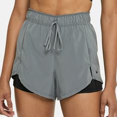 The Nike Flex Essential 2-In-1 Shorts Have A Tight, Stretchy Base Layer Underneath A Loose, Woven Outer Layer. They Give You Plenty Of Flexibility And Have Sweat-Wicking Technology To Keep You Dry And Comfortable. The Woven Outer Shorts Are Made With Nike Flex Fabric That Stretches With Your Body, Helping You Get The Most Out Of Your Performancewithout Getting In Your Way. The Sweat-Wicking, Stretchy Inner Shorts Help Keep You Feeling Dry, Supported And Covered As You Move. Sweat-Wicking Technol Nike Gray Activewear With Built-in Shorts, Nike Gray Workout Shorts, Nike Gray Stretch Shorts, Nike Gray Running Bottoms, Nike Casual Yoga Shorts, Nike Gray Athleisure Shorts, Nike Casual Athletic Shorts For Yoga, Nike Bottoms With Built-in Shorts In Gray, Nike Gray Bottoms With Built-in Shorts