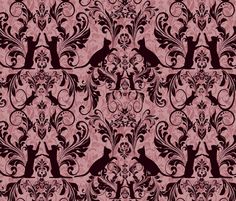 a pink and black wallpaper with cats on it