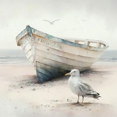 a seagull standing on the sand next to a boat that is sitting on the beach