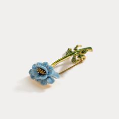 Blue flower Brooch, among our fine jewelry on Selnichast store. It is one of our enamel jewelry that you can give as a birthday gifts for friends or aniversay gift for wife. This is the best enamel jewelry that you cannot miss. This Blue Floral Brooch is a beautiful and timeless accessory for any outfit. Crafted with brass and enamel, this intricate brooch has a classic cottagecore aesthetic that is sure to elevate any look. Perfect for special occasions or everyday wear, this piece is sure to b Yellow Gold Enamel Brooches, Yellow Gold Enamel Brooches For Gifts, Elegant Yellow Gold Enamel Pin Gift, Formal Flower Enamel Brooches, Elegant Blue Enamel Brooches, Formal Flower-shaped Enamel Brooches, Blue Enamel Brooch For Gift, Blue Enamel Brooch Gift, Blue Enamel Brooches For Gift