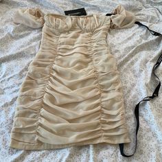 Cute Ruched Mini Dress With Off The Shoulder Sleeves. Us Size 2. Just Realized Illl Never Fit Into This No Matter How Hard I Try So It’s Time For It To Find Someone Else To Enjoy It! Beige Dresses With Ruched Bodice For Party, Beige Party Dress With Ruched Bodice, Party Dress With Ruched Bodice In Beige, Beige Lined Mini Dress, Cream Fitted Mini Dress For Casual Occasions, Cream Ruched Mini Dress For Party, Beige Mini Dress With Ruched Bodice For Spring, Beige Ruched Mini Dress For Summer, Knee-length Beige Lined Mini Dress