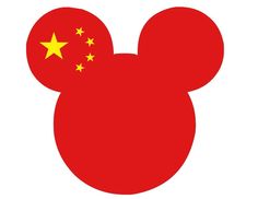 a red mickey mouse with yellow stars on it's head and the chinese flag in the background