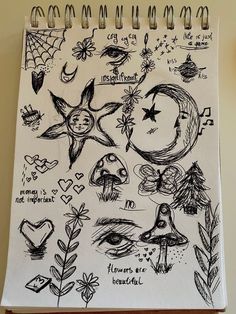 a notebook with some drawings on it