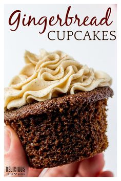 a hand holding up a chocolate cupcake with white frosting on top and the words gingerbread cupcakes above it