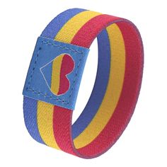 a colorful bracelet with a heart on the front and blue, red, yellow and purple stripes