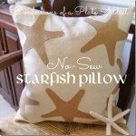 two starfish pillows stacked on top of each other in front of a rocking chair