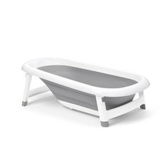 a white and gray baby bathtub on a white background with the seat up to it's side