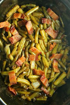 green beans and bacon cooking in a pot