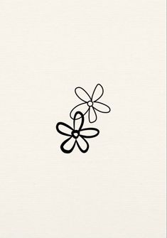 a black and white drawing of a flower on a white paper with the word love written in it