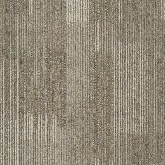 an up close view of a carpet with vertical stripes in grey and beige colors,