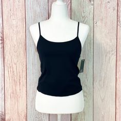 Basic Fitted Black Tank Top, Basic Fitted Camisole For Spring, Seamless Casual Camisole For Night Out, Casual Seamless Camisole For Night Out, Casual Solid Color Workout Camisole, Casual Workout Camisole, Basic Black Spring Tank Top, Basic Black Tank Top For Spring, Black Fitted Trendy Camisole