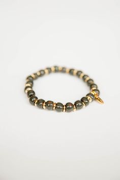 Bel Koz 14k Gold Accented Clay Bracelet - Betsey's Boutique Shop - Gold Beaded Hematite Bracelets, Gold Hematite Beaded Bracelets, Adjustable Gold Hematite Bracelets, Hand-strung Hematite Bracelet Jewelry, Hand-strung Hematite Bracelet, Clay Beaded Bracelets, Clay Bracelet, Handmade Clay, Clay Beads