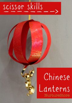 an ornament made out of red paper and gold ribbon with the words scissors skills chinese lanterns