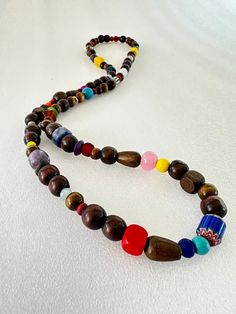 Boho style long necklace handmade with wood, Native American, gemstone, glass and ceramic beads. Bohemian Long Necklace With Wooden Beads As A Gift, Bohemian Long Necklace With Wooden Beads, Multicolor Wooden Beads Long Necklace, Multicolor Long Necklace With Wooden Beads, Bohemian Long Wooden Beaded Necklaces, Bohemian Long Wooden Beaded Necklace, Brown Long Beaded Necklace With Wooden Beads, Long Brown Beaded Necklace With Wooden Beads, Brown Long Necklace With Colorful Beads