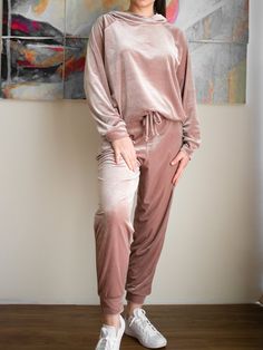 Long sleeve hooded sweatshirt with adjustable drawstring at waist and elastic waist track pants. Comfortable, cozy homewear. Available in different colors and sizes. Fabric composition: 90% Polyester, 10 % Elastane Comfy Tracksuit For Loungewear In Fall, Comfy Fall Loungewear Tracksuit, Comfy Fall Tracksuit For Loungewear, Cozy Fit Tracksuit For Fall Loungewear, Fall Loungewear Tracksuit With Cozy Fit, Cozy Tracksuit For Fall Loungewear, Comfortable Winter Tracksuit For Loungewear, Cozy Tracksuit For Loungewear In Fall, Cozy Fall Tracksuit For Loungewear