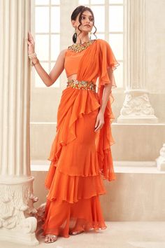 Orange pre-draped sari set – INDIASPOPUP.COM Tiered Saree, Pageant Wardrobe, Floral Work Blouse, Floral Cutwork, Indian Fits, Saree Gowns, Sleeveless Blouse Designs, Elegant Sarees, Saree Drape