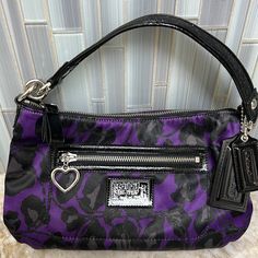 Purple & Black Bold Fashion Statement Silver Accent Pristine Interior W 2 Pockets, 1 Zippered Laying Flat Measures Approx 11” X 8” Great Hardware!! Coach Bag, Silver Accents, Bold Fashion, Purple Black, Purple And Black, Coach Bags, Fashion Statement, Zipper, Purple