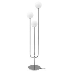 three light floor lamp with two white balls on the top and one black ball on the bottom