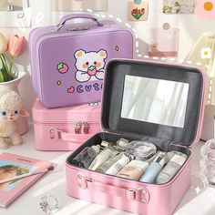 The Cute Cosmetic Cases are perfect for storing your makeup and beauty essentials. Each case features a different kawaii animal design - a bunny, bear, or puppy - and comes with a handy mirror inside the lid for touch-ups on the go. The cases are made with high-quality materials and are perfect for organizing your makeup at home or for taking it with you when you travel. The cases are just the right size to fit in your purse or backpack, making them a convenient and stylish option for anyone who Pink Portable Cosmetic And Toiletry Storage For Personal Use, Cute Pink Cosmetic Bag For Storage, Cute Pink Rectangular Cosmetic Storage, Cute Pink Cosmetic Travel Storage, Kawaii Rectangular Portable Cosmetic Bag, Cute Rectangular Cosmetic Bag For Gift, Cute Rectangular Cosmetic Bag Gift, Kawaii Portable Rectangular Cosmetic Bag, Cute Pink Travel Cosmetic And Toiletry Storage