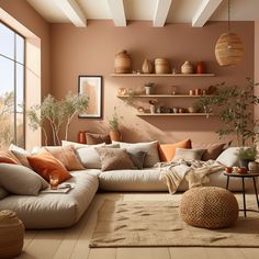 a living room filled with lots of furniture next to a large window covered in potted plants