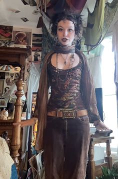 Gothic Fairy Core Outfits, Grunge Brown Outfit, Overaccessorized Outfits, Alternative Street Fashion, Brown And Red Outfit Ideas, Winter Outfits Whimsigoth, Brown Flared Jeans Outfit, Earthy Fashion Style, Boho Layered Outfits