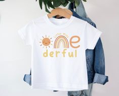 Onederful First Birthday t-shirt T-shirt is 100% Australian cotton.  We design & print our products with care & love! We use the best quality vinyls, inks & transfers on all products. * * * * * * * * * * * * * * * * * * * * * * * * * * * * * CARE INSTRUCTIONS: Wash inside out on gentle wash, Do not tumble dry. * * * * * * * * * * * * * * * * * * * * * * * * * * * * * SHIPPING: We want to get your product to you as quickly as possible, your purchase will be shipped through Australia post, Express post is available for selection. * * * * * * * * * * * * * * * * * * * * * * * * * * * * * GUARANTEE: We stand behind our products with a 100% guarantee; if you are unsatisfied with our product, please let us know & we will rectify any issues. We are unable to refund products due to change of mind 1st Birthday Outfits, Ink Transfer, Gender Neutral Baby, Birthday Outfit, Infant Tees, Baby Bodysuit, Girl Birthday, Onesies, First Birthdays