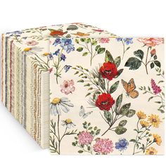 a set of four notebooks with flowers and butterflies on them