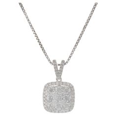 This exquisite pendant features a cushion shape design, crafted in 18KT white gold. It is adorned with 0.77 carats of round brilliant cut diamonds, with G color and VS1-VS2 clarity. The diamonds add exceptional sparkle and elegance to the piece, making it a perfect choice for special occasions or adding a touch of luxury to everyday wear. Snowflake Pendant, Gold Cushions, Elegant Pendant, Diamond Chain, Cluster Pendant, Modern Necklaces, Diamond Cluster, Round Brilliant Cut Diamond, Diamond Stone