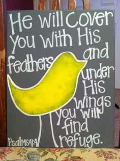 a sign that says he will cover you with his feathers and under his young wings find refuge