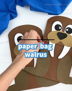 someone is making a paper bag walrus