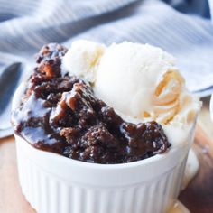 a bowl filled with ice cream and chocolate pudding