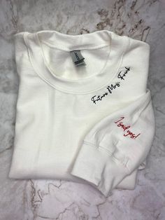 "Welcome to my store! Looking for a unique sweatshirt? These embroidered sweatshirts can be a fantastic choice for various occasions such as anniversaries, Mother's Day, Father's Day, Christmas Day,... gifts for your boyfriend or husband, or even as a memento for a special date in your relationship. Our Process is embroidery. How to order: -Select the shirt style, size and color. -Add to cart. Easy and simple. Material: -50% Cotton, 50% Polyester -All hoodies and crewneck sweatshirts are fleece Care instructions: -Machine cold wash, inside out, with like colors. Only non-chlorine bleach. -Tumble dry low. -Medium iron. Do not iron decoration. -Size chart is available in the listing photos. All measurements are approximate. Measurements may vary about 1\" less or more. -This listing is for o Mrs Hoodie, Fiance Sweatshirt, Mrs Sweatshirt, Sweatshirt Embroidery, Unique Sweatshirt, Bride Shirt, Gifts For Fiance, I Said Yes, Future Mrs