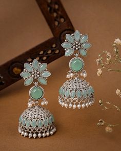 "Put a little pep in your step with these Reshma Jhumki Earrings. These silver oxidized earrings feature a pretty flower design with trendy pearl work, making them the perfect accessory for any occasion. Add some flair to your outfit and make a subtle statement of style!" Indian Traditional Jewellery, Oxidized Earrings, Pearl Work, Paper Bead Jewelry, Jhumki Earrings