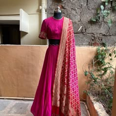 lehenga set  |womens lehenga choli |crop top lehenga set |designer banarasi lehenga dupatta | wedding lehenga choli | lehenga usa Women's lehenga set /banarasi embroidered lehenga skirt/voggish      lehengas are one of the beautiful and versatile traditional attires of india !! we carry such pieces in budget with great quality that can be styled in multiple ways with different outfits !!       Here is Beautiful Pink embroidered waist pure chinnon skirt paired with matching hand embroidered zero neck and elbow sleeve crop top as shown!! This set comes with matching pure handloom banarasi bandhej khaddi georgette dupatta as shown , dupatta design might change bcz of the Handloom !! Skirt has heavy gear and both pieces can be mix and matched with different outfits !! Ready to ship All over th Bandhani Crop Top Lehenga, Raw Silk Outfits Style, High Neck Crop Top Lehenga, Bandhej Dupatta Lehenga Choli, Bandhini Lehenga Choli, Bandhini Dupatta Lehenga, Banarasi Dupatta Lehenga, Bandini Halfsarees, Banarasi Georgette Lehenga