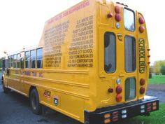 a yellow school bus parked in a parking lot