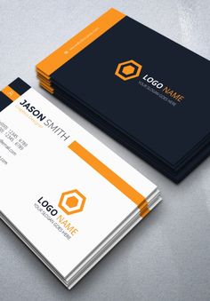 two business cards with orange and black accents on the front, one has a hexagon