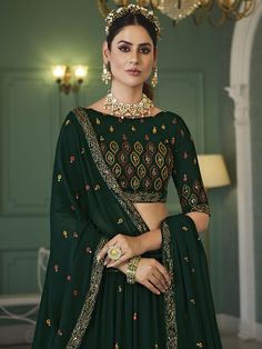 Buy redefined green georgette embroidered lehenga choli for celebrating upcoming festival celebrations. Shop this outstanding lehenga choli which comes with a Georgette blouse and Georgette dupatta. Green Georgette Lehenga With Cutdana, Green Georgette Lehenga With Cutdana Details, Green Georgette Choli With Cutdana, Green Semi-stitched Lehenga With Dupatta, Semi-stitched Green Lehenga With Dupatta, Green Lehenga With Cutdana In Traditional Drape, Green Semi-stitched Choli With Cutdana Details, Green Georgette Navratri Sets, Green Semi-stitched Cutdana Choli