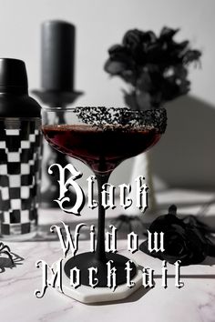 A dark red mocktail that looks like blood, in a black and white spooky scene with a cocktail shaker and Halloween decorations. Black Non Alcoholic Drink, Gothic Mocktails, Non Alcoholic Fantasy Drinks, Virgin Halloween Cocktails, Vegan Halloween Cocktails, Witchy Drinks Non Alcoholic, Vampire Mock Tails, Black Mocktails Non Alcoholic, Dark Mocktails