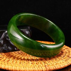 Inside Diameter 65mm Chinese Natural Green Hetian Jade Bracelet Dimension:20(mm)0.79(inches) Inside Diameter:65(mm)2.56(inches) Weight:0.21lbs/93g      Condition: Please look at pictures carefully and judge the condition before bidding.Please do not hesitate to contact me if you have any question with my items or don't understand the condition of the items after reading my listing page. Shipping / Handling Estimate 7-10 business days arrival depending on your location and tracking number will be Classic Green Round Bangle, Classic Green Bangle Bracelet, Luxury Green Bangle Bracelets, Green Classic Bangle For Formal Occasions, Classic Green Bangle Jewelry, Luxury Green Bracelets, Dimension 20, Hetian Jade, Jade Bracelet