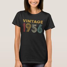 a woman wearing a vintage t - shirt with the year 1953 printed on her chest