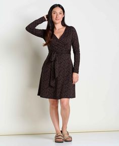 Dress up or down, no comfort sacrificed. A faux wrap is cute as can be but will stay secure, and a self-tie adds a bonus dose of pizzazz. Black Wrap Dress With Surplice Neckline For Fall, Black Wrap Dress For Fall, Fall Wrap Dress With Tie Waist And Surplice Neckline, Fall Wrap Dress With Surplice Neckline And Tie Waist, Long Sleeve Dress Black, Tencel Dress, Resale Shops, Black Long Sleeve Dress, Black Dots