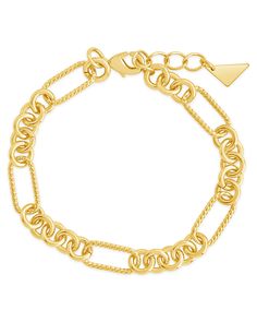 Introducing our Fianna Mixed Chain Link Bracelet, crafted with textured long links in a luxurious mixed metal design. Elevate your style with this sophisticated and exclusive piece, perfect for any occasion. Make a statement and add a touch of elegance to your wardrobe. Material: 14K gold or rhodium plated brass Features: Measures 7" length with 1" extender,,15x7mm oval links and 6mm round links lead and nickel free with lobster clasp Solid Gold Bracelet, Statement Drop Earrings, Mens Accessories Jewelry, Earring Sale, Cuff Bangles, Jewelry Case, Chains For Men, Pearl Studs, Pearl Drop Earrings